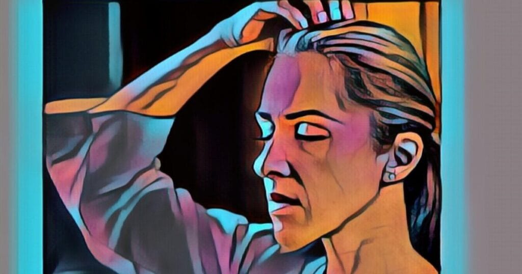 Image: Lady with her eyes closed tapping on the top of her head.